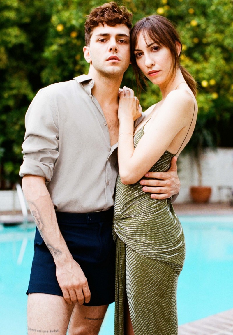 Xavier Dolan and Gia Coppola get close for a photo poolside.