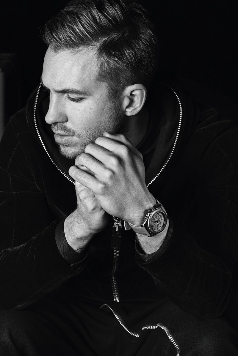 Posing for a close-up, Calvin Harris shows off one of Emporio Armani's timepieces for its fall-winter 2015 campaign.