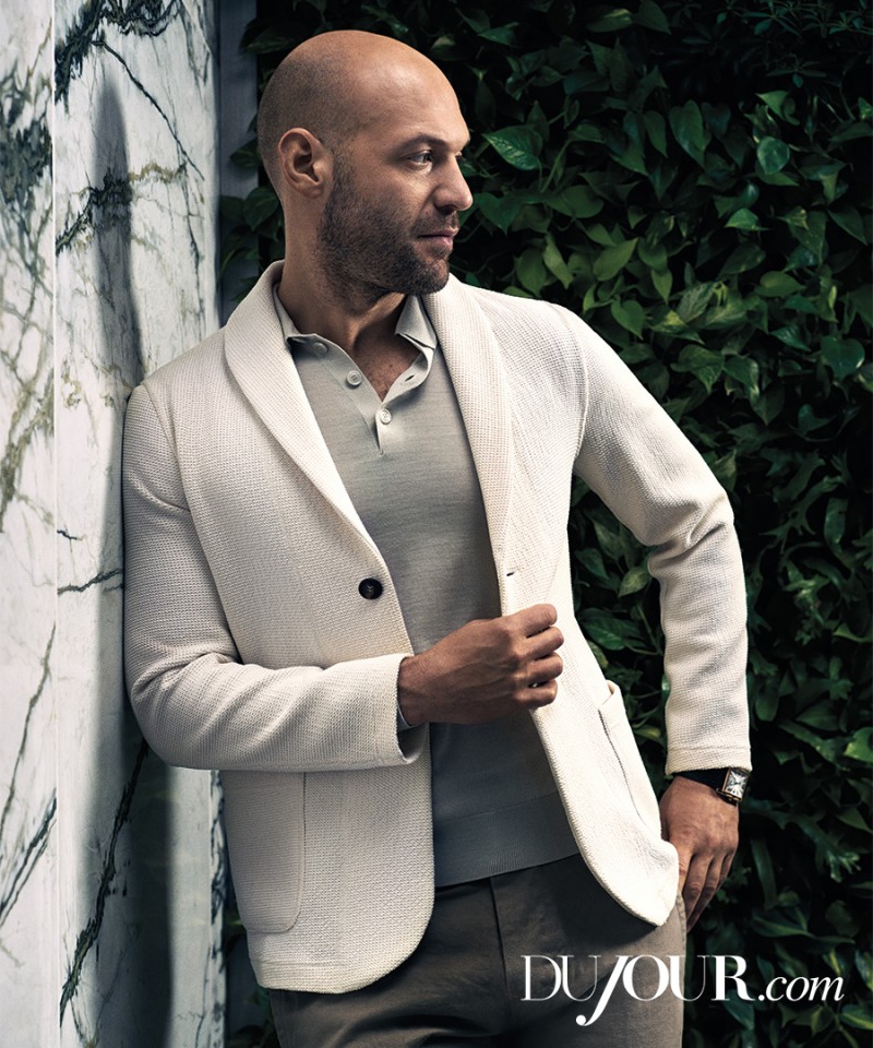 Corey Stoll sports a Giorgio Armani blazer and polo shirt with Billy Reid trousers.