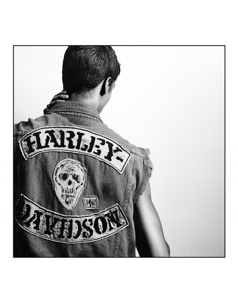 Brandon wears vest Harley Davidson.
