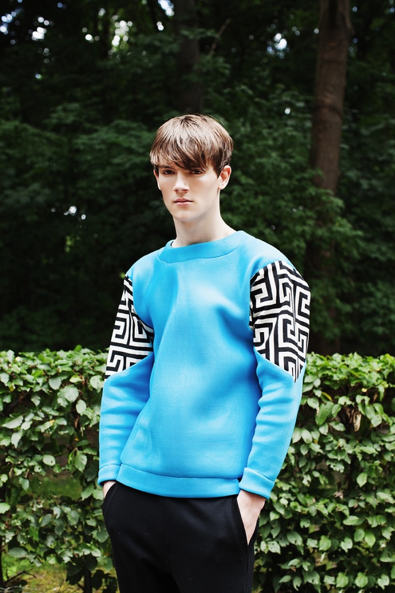 Callum wears pullover Tosca Wyss by Blank Etiquette and pants Element.