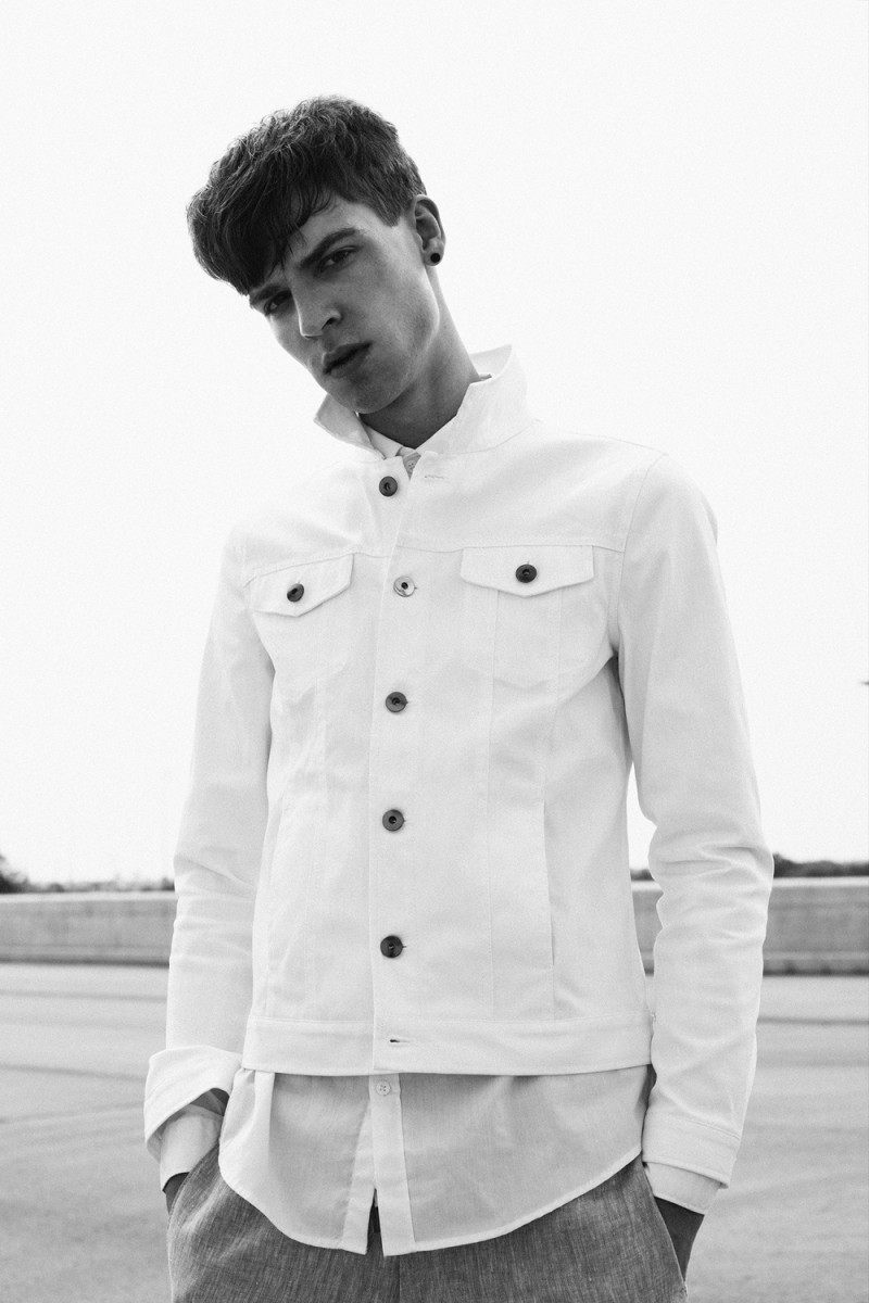 Hubert wears denim jacket Zara, shirt Armani and pants Zegna.