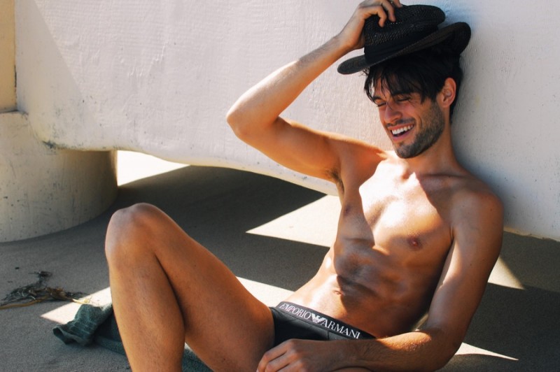 Lucas wears underwear Emporio Armani and hat Zara.