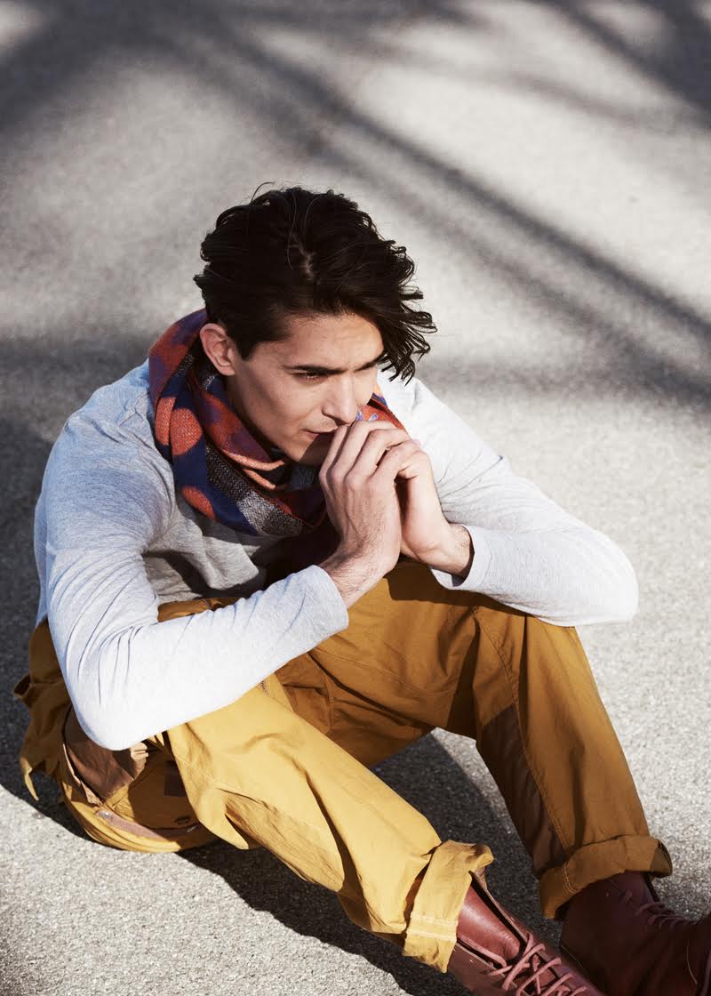 Mounier wears jumpsuit Henrik Vibskov, turtleneck Apocs, scarf Henrik Vibskov and shoes Filippa K.