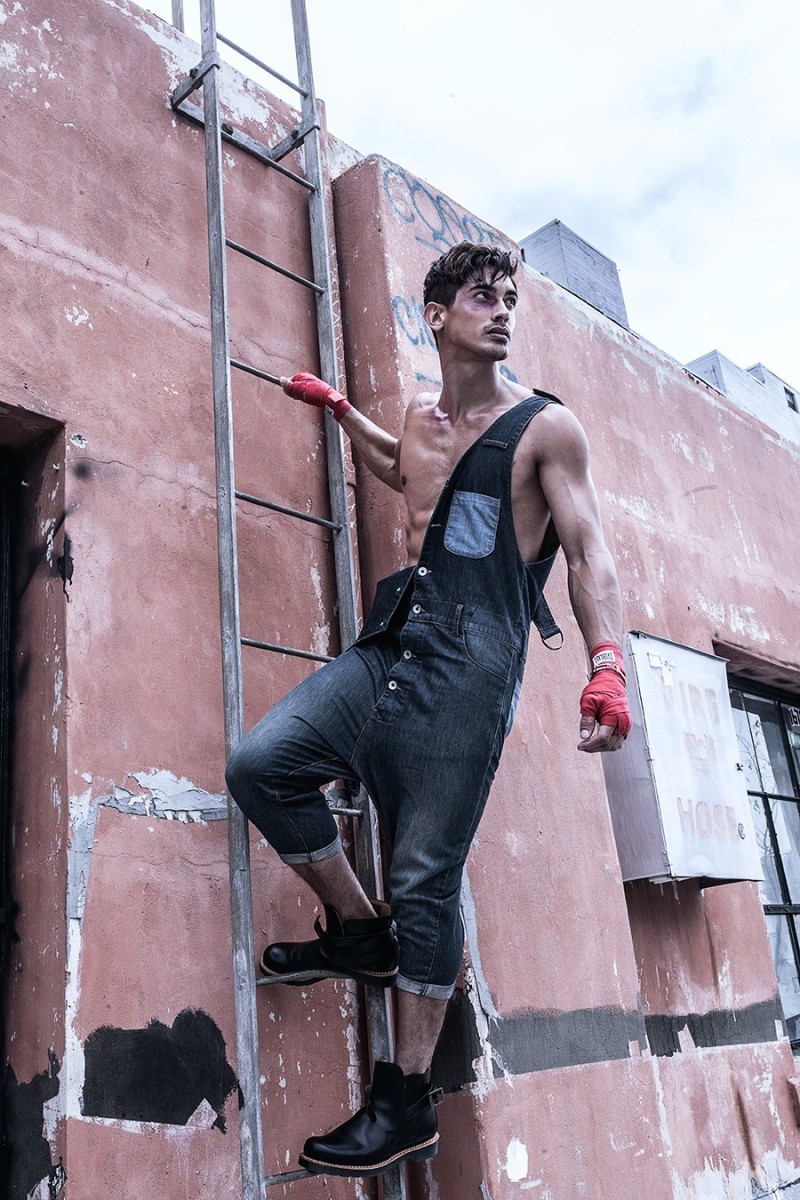 Stefano wears overalls Prospective Flow, boots Dr Marten, bracelet and rings Han Cholo.