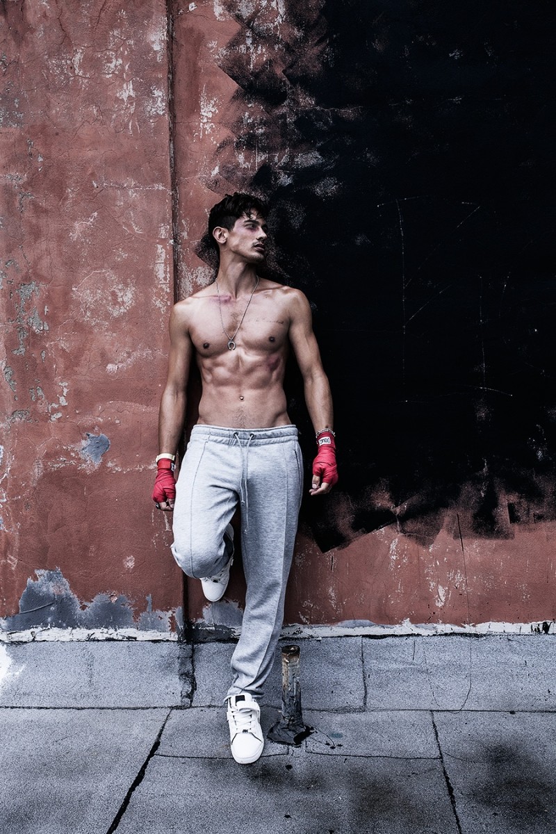 Stefano wears joggers Fanzel Amsterdam, shoes Android Homme, bracelet and rings Han Cholo, necklace and watch Flüd.