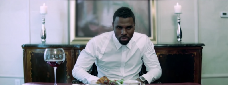 Wearing an Alexander McQueen harness shirt, Jason Derulo takes in a disturbing dinner for his Cheyenne music video.