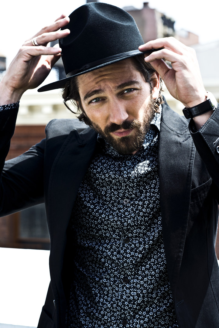 Michiel Huisman Dons Chic Fashions for Man of the World Cover Shoot