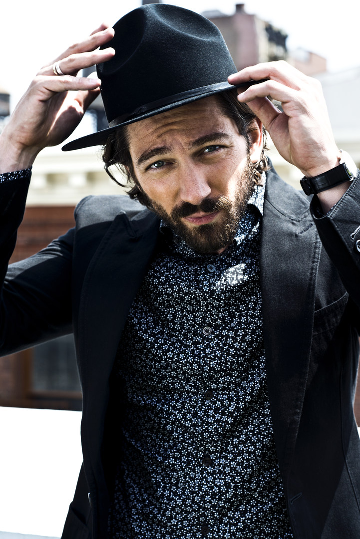 Michiel Huisman Dons Chic Fashions for Man of the World 