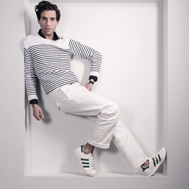 Mika graces the pages of Neon with a nautical-inspired look that includes a Breton striped knit.