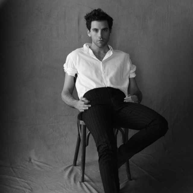 Mika photographed by Peter Lindbergh in a chic shirt and trouser combo for his No Place in Heaven album art.