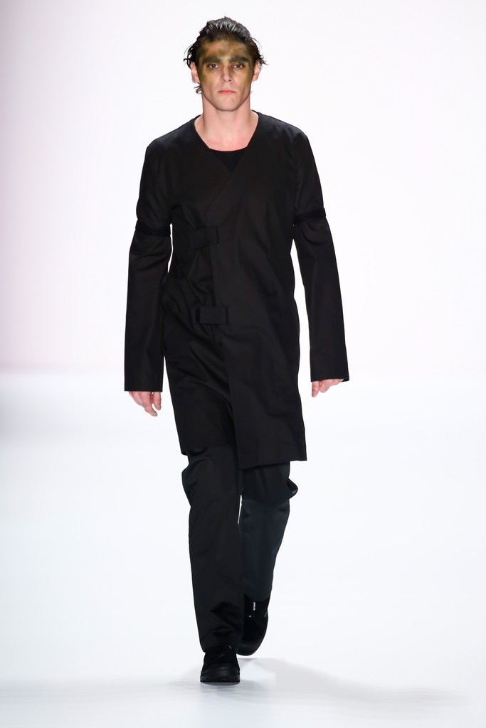 RJ Mitte dons a head to toe black look as he walks for SoPopular during Berlin Fashion Week.