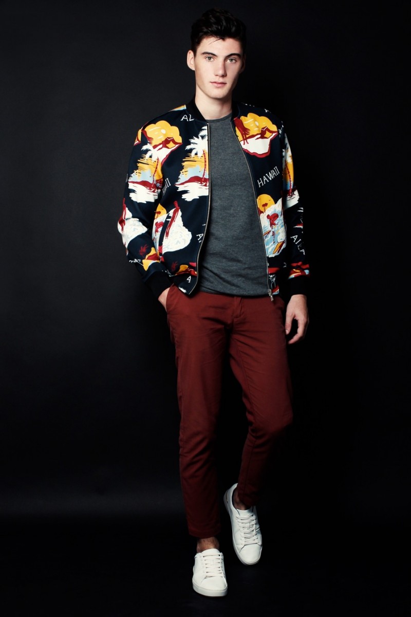 Robin wears bomber jacket Zara, t-shirt Calvin Klein, pants J.Crew and sneakers Adidas Originals.