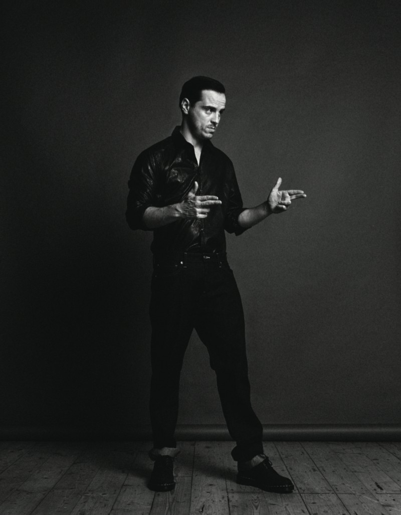 Andrew Scott wears leather shirt S.P.O. Copenhagen, jeans Levi's and shoes Dr Martens.