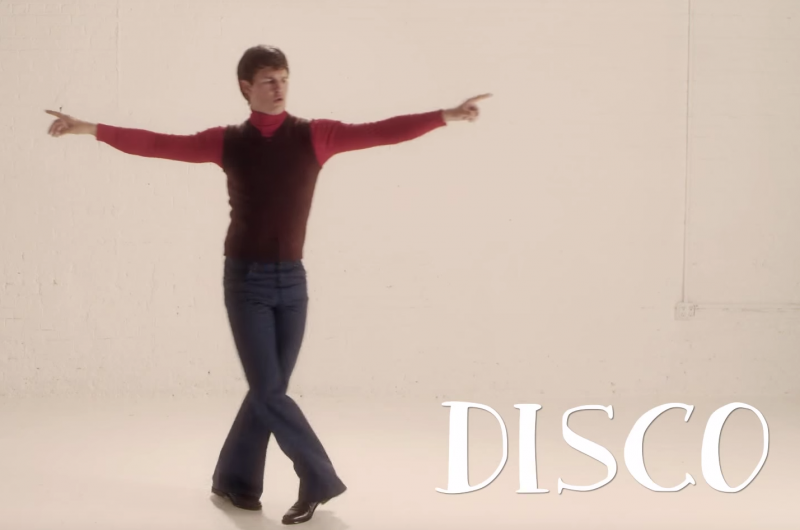 Ansel Elgort embraces his flared pants for a 1970s disco lesson.