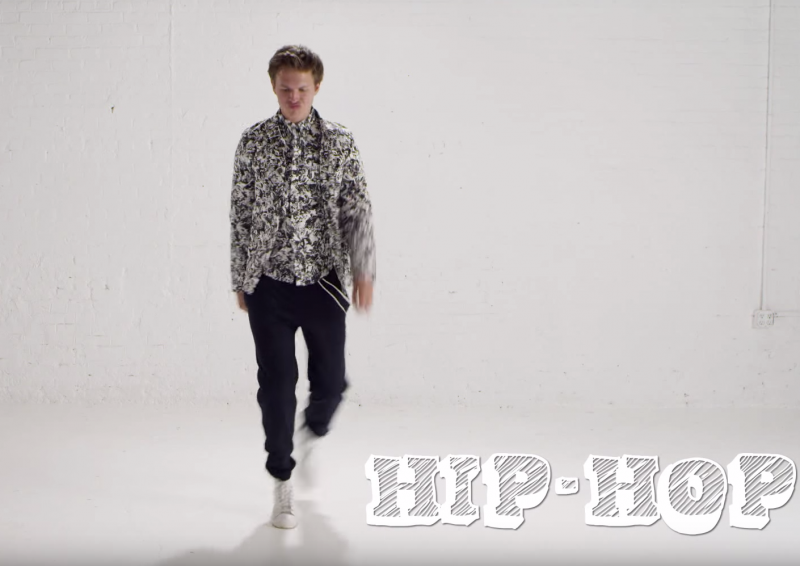 Ansel Elgort puts on a stank face as he performs 1980s hip-hop.
