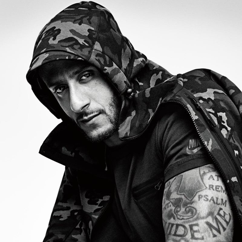 Football player Colin Kaepernick wears Nike Tech Fleece Collection.