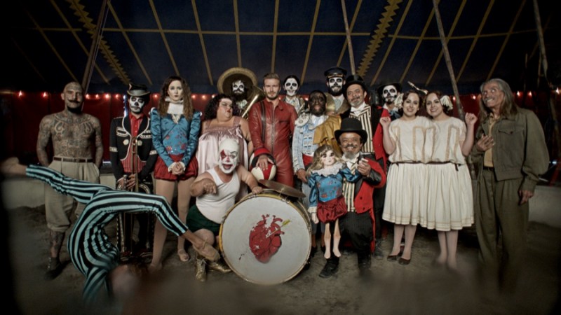 David Beckham poses with a freak show ensemble for Belstaff's Outlaws film.