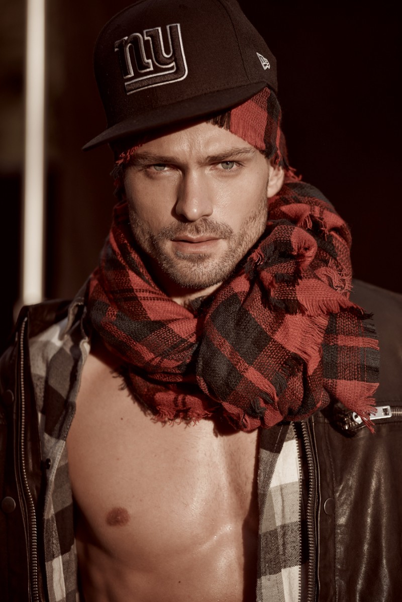 Michael wears hat H&M, scarf Cotton On, shirt Quicksilver and leather jacket Diesel.