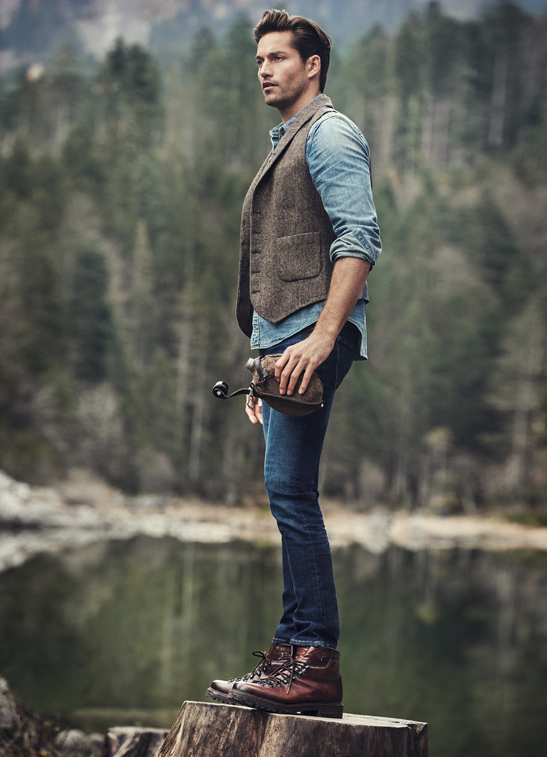 Greg Kheel embraces rugged style in denim and a waistcoat.