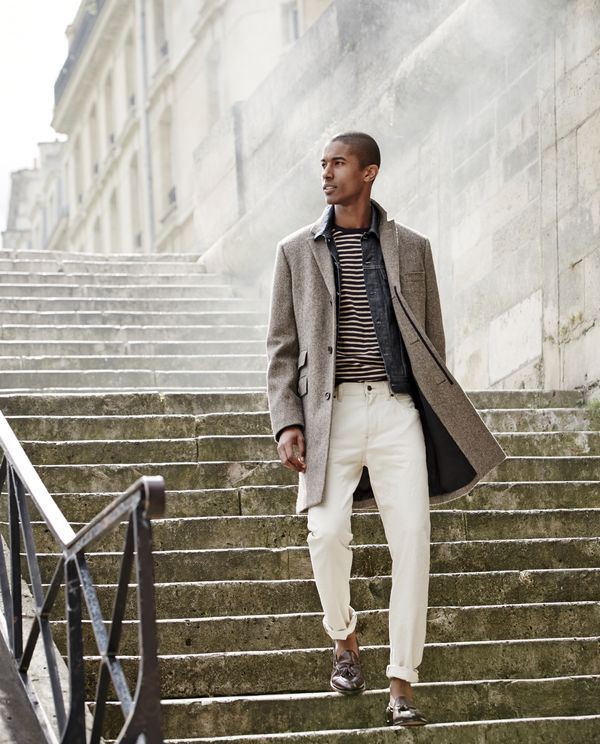 Claudio Monteiro warms up to fall with a sharp coat and neutral pants.