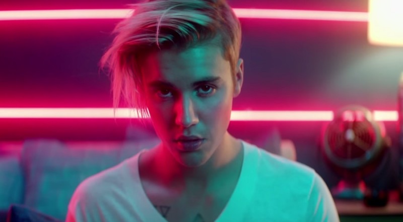 Justin Bieber sports a white Calvin Klein v-neck in his What Do You Mean? music video.