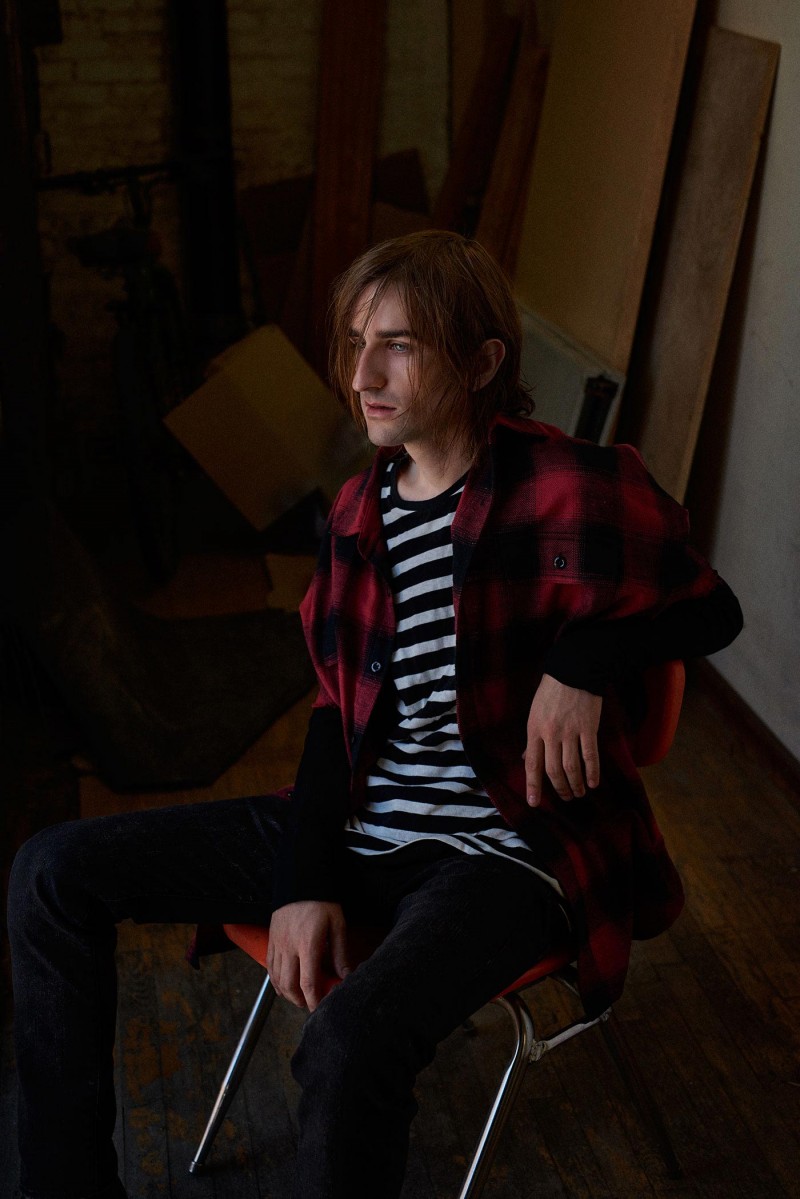 Jeremy Cox rocks R13's oversized, red plaid shirt with a striped tee and Skate jeans.