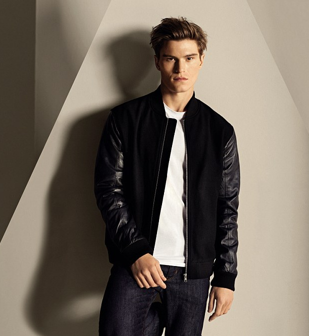 Oliver Cheshire dons a leather bomber jacket for Marks & Spencer Autograph's fall-winter 2015 campaign.