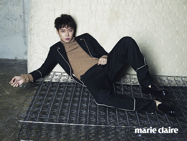 Photographed for Marie Claire Korea, Park Yoochun dons a Gucci suit featuring white piping.