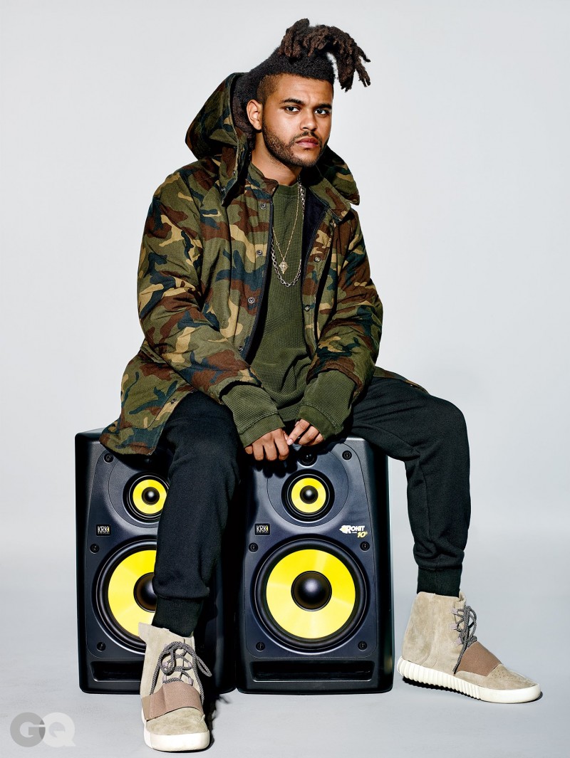The Weeknd rocks a camouflage look from Kanye West's Adidas Yeezy Season 1 collection.