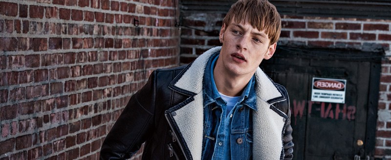Model Roberto Sipos rocks a leather shearling jacket over denim for Tom Tailor Denim's fall-winter 2015 campaign.