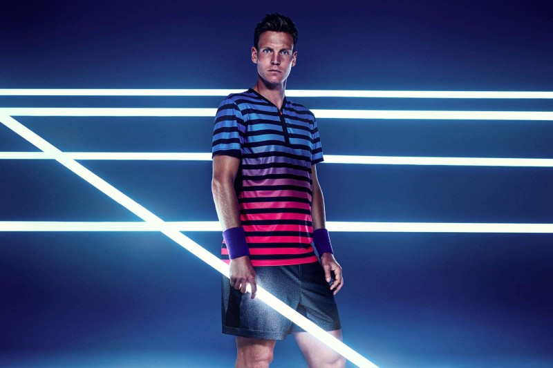 Tomas Berdych sports a colorful striped top from his new H&M tennis collection.