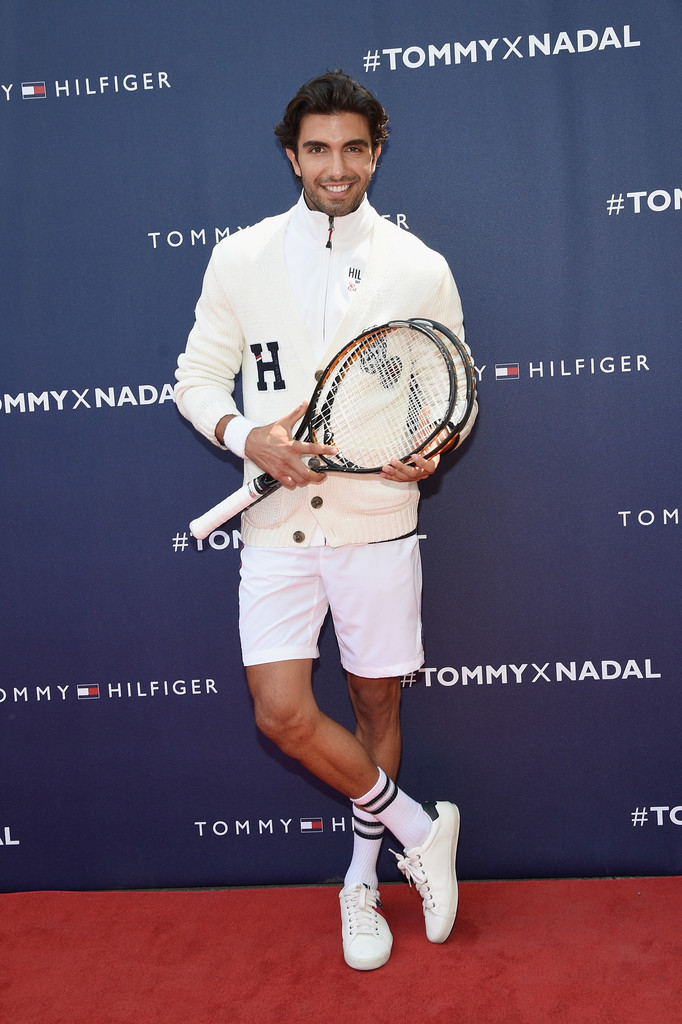 Akin Akman hits the red carpet in a Tommy Hilfiger tennis inspired look.