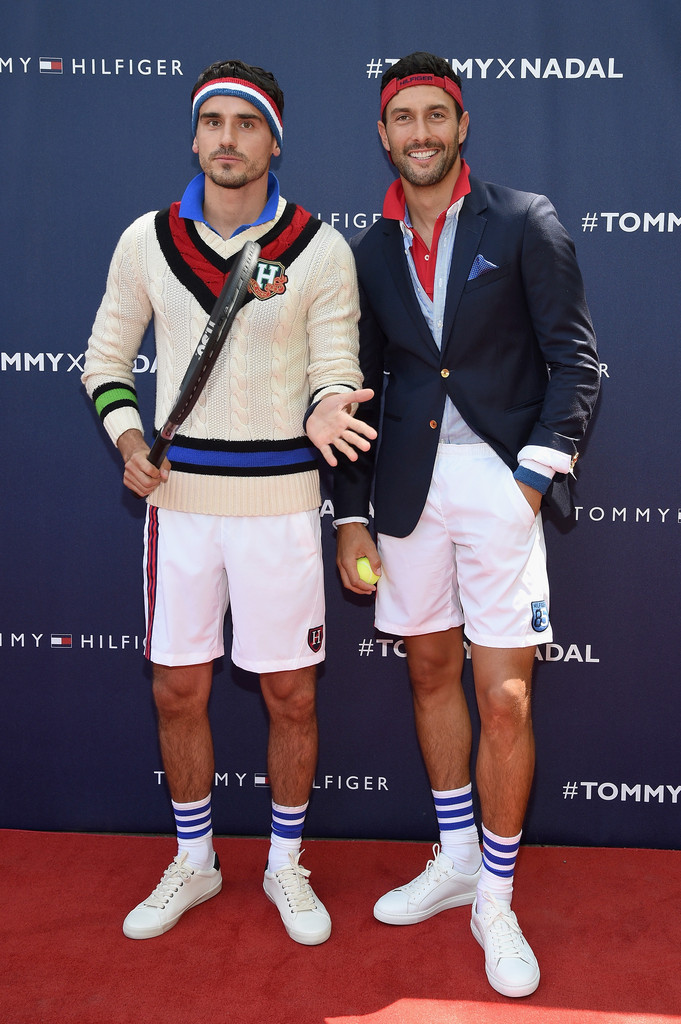 Top models Arthur Kulkov and Noah Mills pose for pictures.