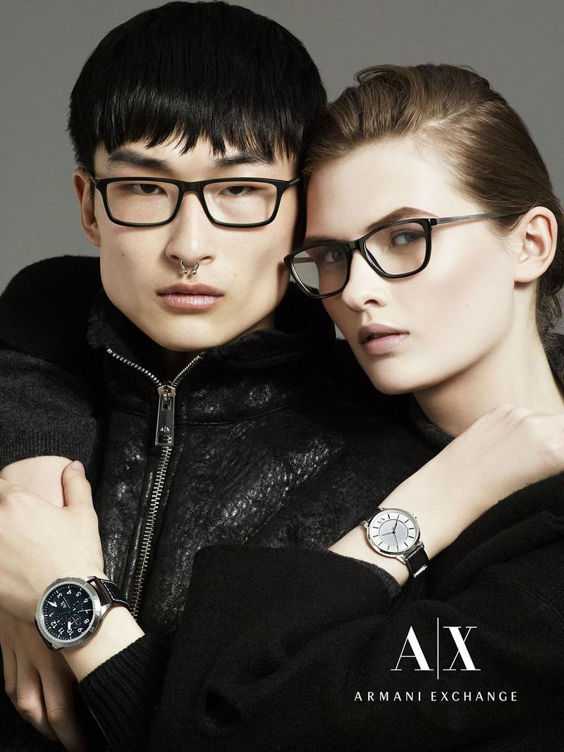 After appearing in an urban setting for Armani Exchange's fall-winter 2015 campaign, model Sang Woo hits the studio for the brand's eyewear advertisement. Photographed by Riccardo Vimercati, Sang joins beauty Lara Mullen.