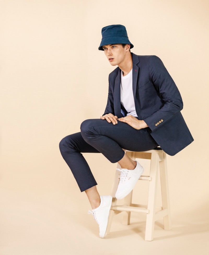 Matthew Holt dons a bucket hat and white sneakers with a suit for Bensimon's spring-summer 2016 campaign.