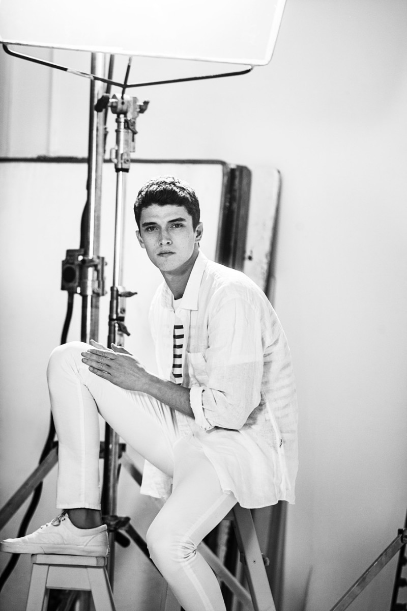 British model Matthew Holt is ready for summer in a serene white ensemble.