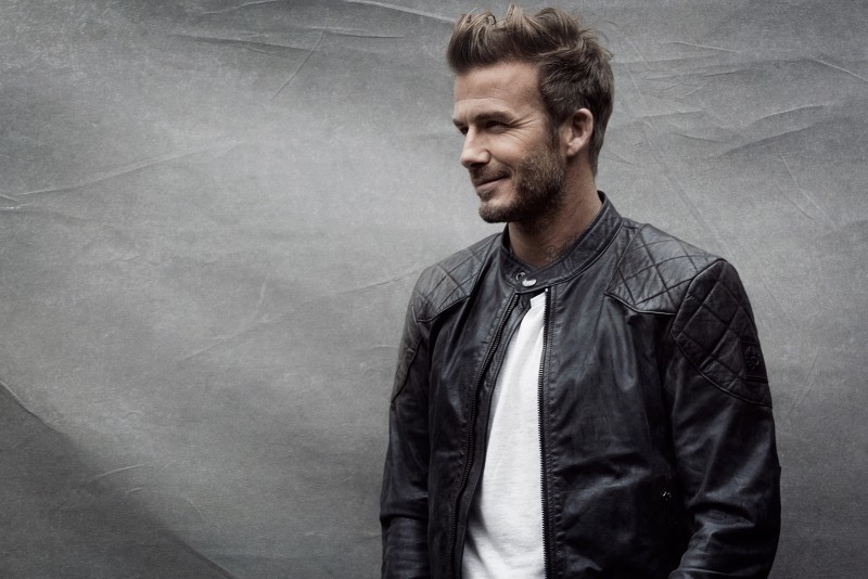David Beckham goes casual in a Belstaff leather jacket.