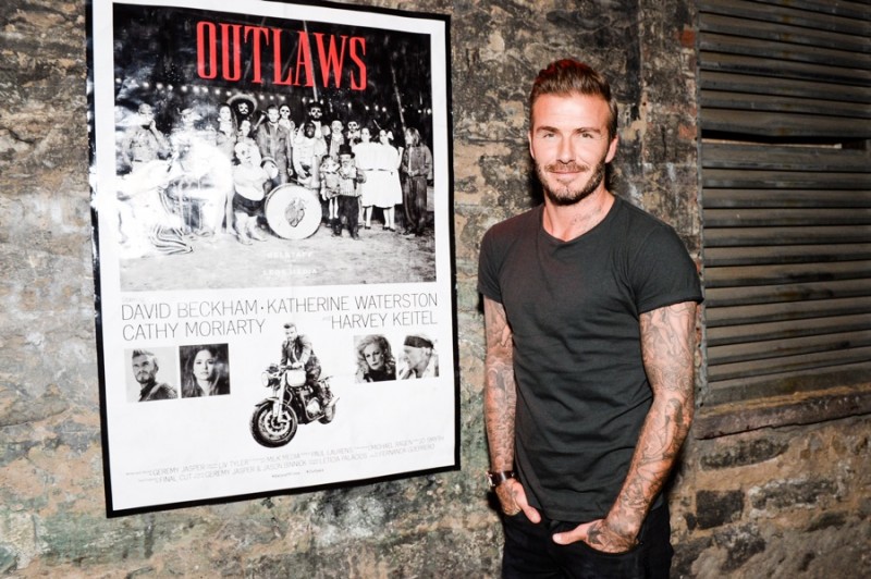 David Beckham poses for pictures at a New York celebration for his new Belstaff film, Outlaws.
