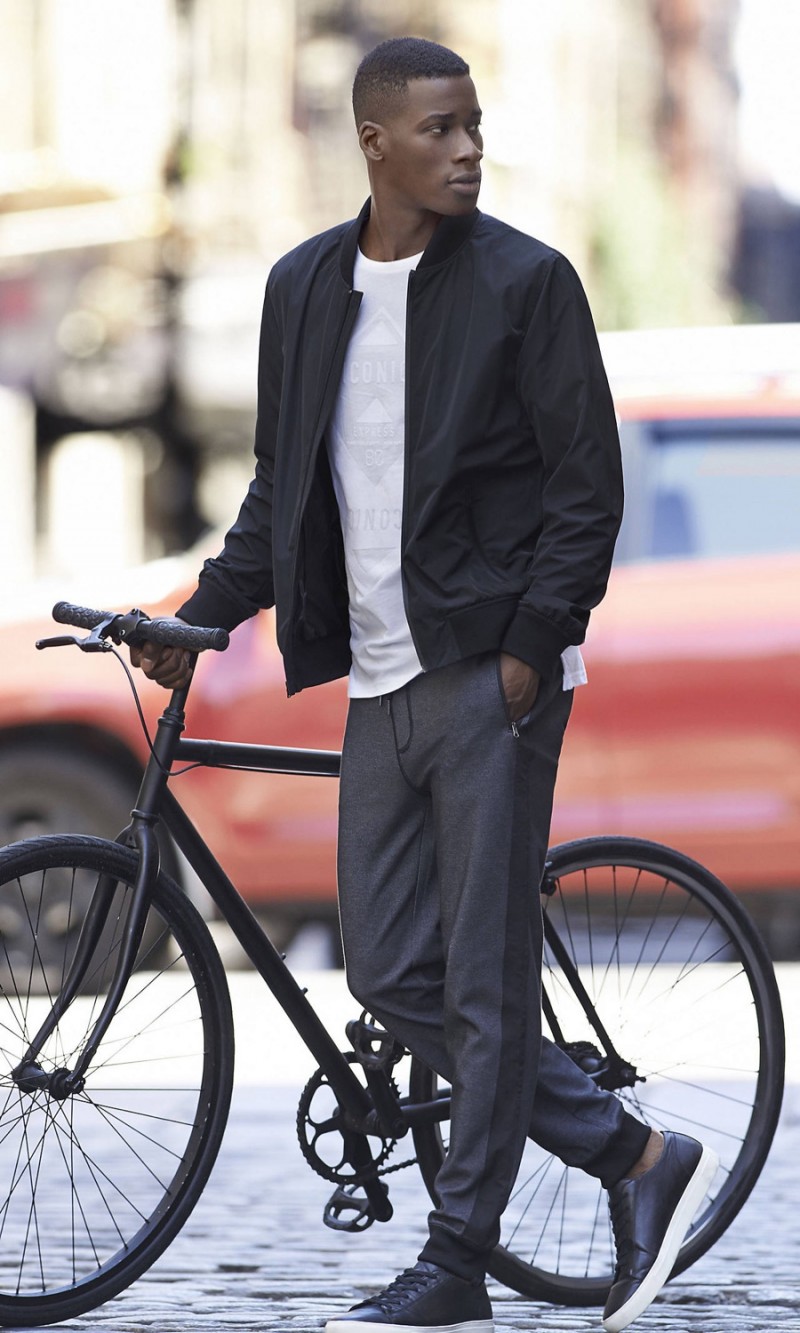 David Agbodji is sporty in Express joggers and a bomber jacket.