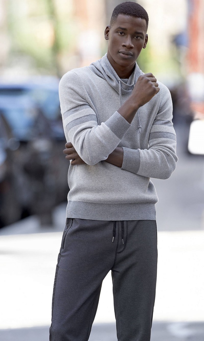 David Agbodji wears an Express knit pullover with a cowl neck.