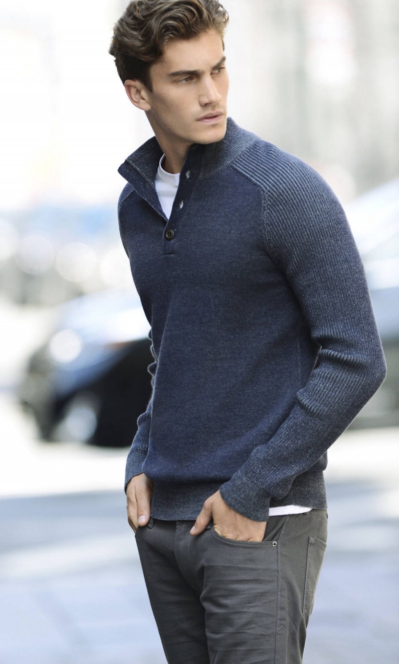 Tomas Guarracino wears an Express half-button sweater.