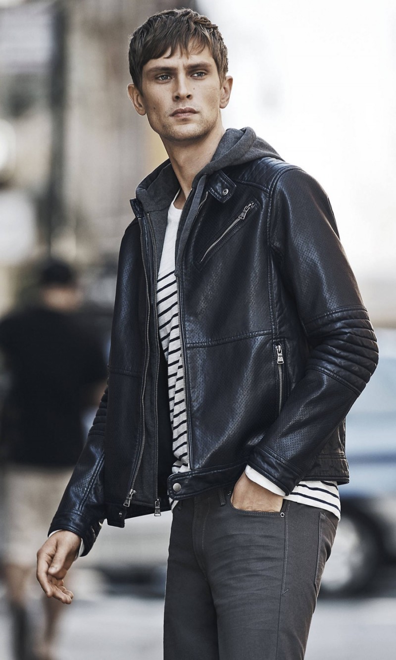 Mathias Lauridsen rocks an Express leather jacket over a hoodie.
