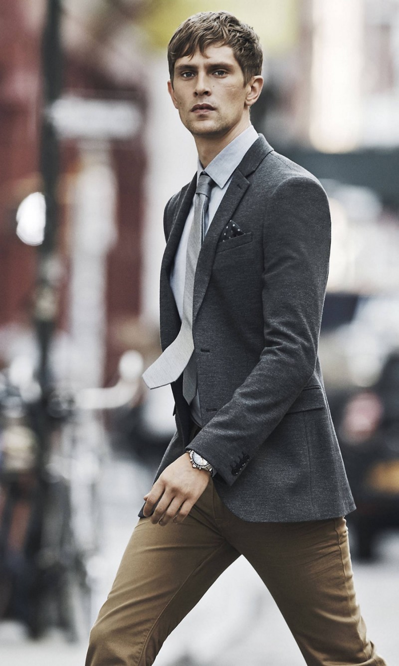Mathias Lauridsen keeps his style smart in an Express blazer and chinos.