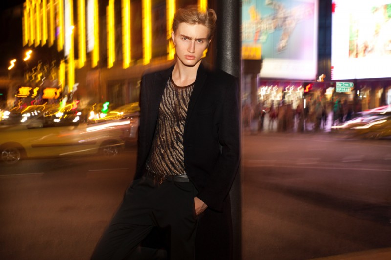 Dylan wears mesh top stylist's own, coat Alexander McQueen and belt Massimo Dutti.