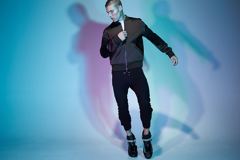 Brandon wears jacket Neil Barrett, pants Balmain and shoes Giuseppe Zanotti.