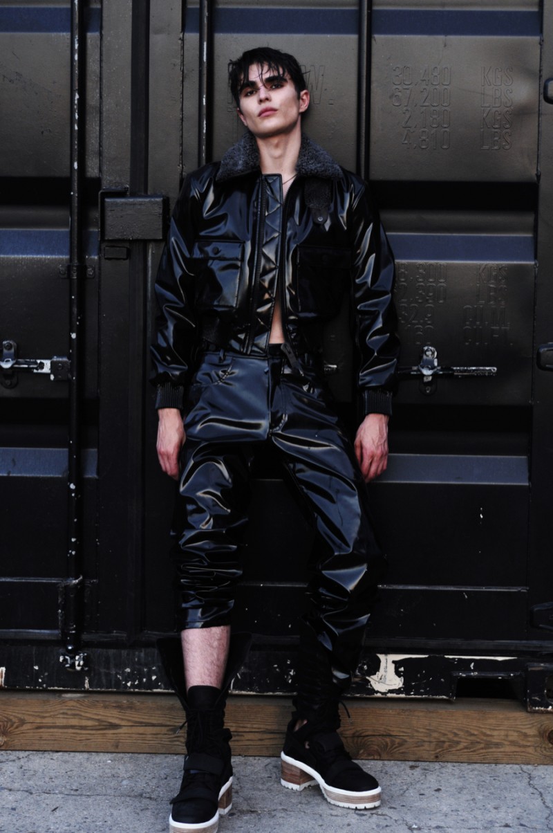 Diego wears boots Hood By Air, coat and pants Calvin Klein Collection.