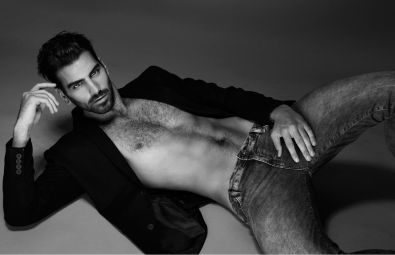 Nyle wears blazer AllSaints and jeans Topman.