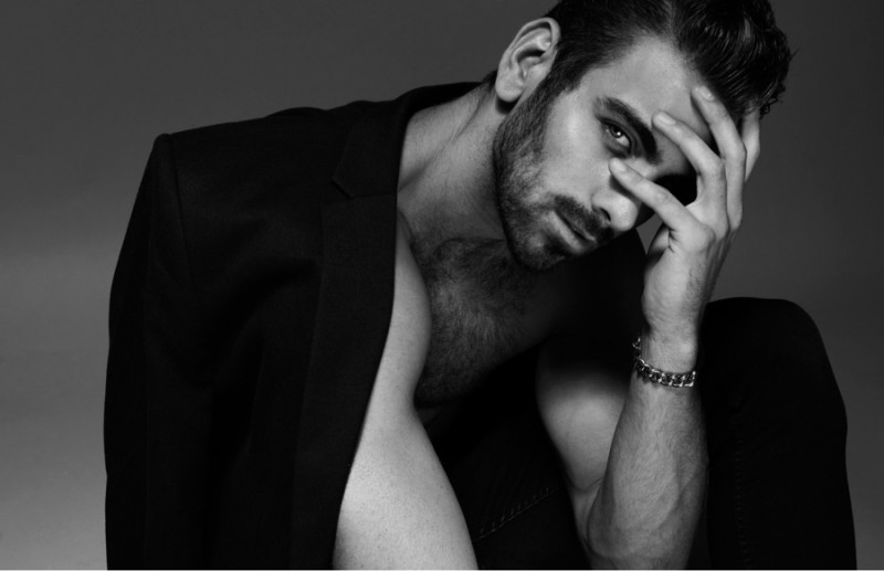 Nyle wears blazer AllSaints, jeans Topman and bracelet ASOS.