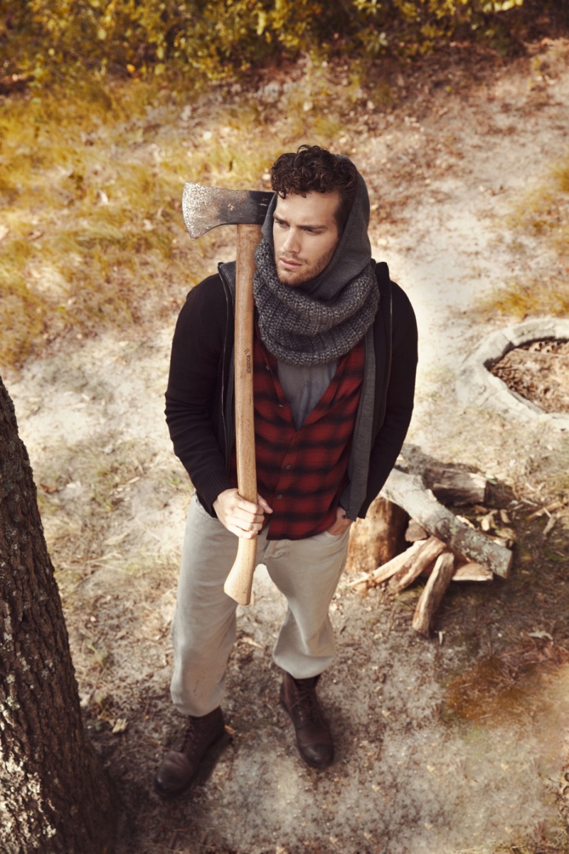 Sean wears plaid button-down Public School, jeans John Varvatos, snood, cardigan and boots Dolce & Gabbana.